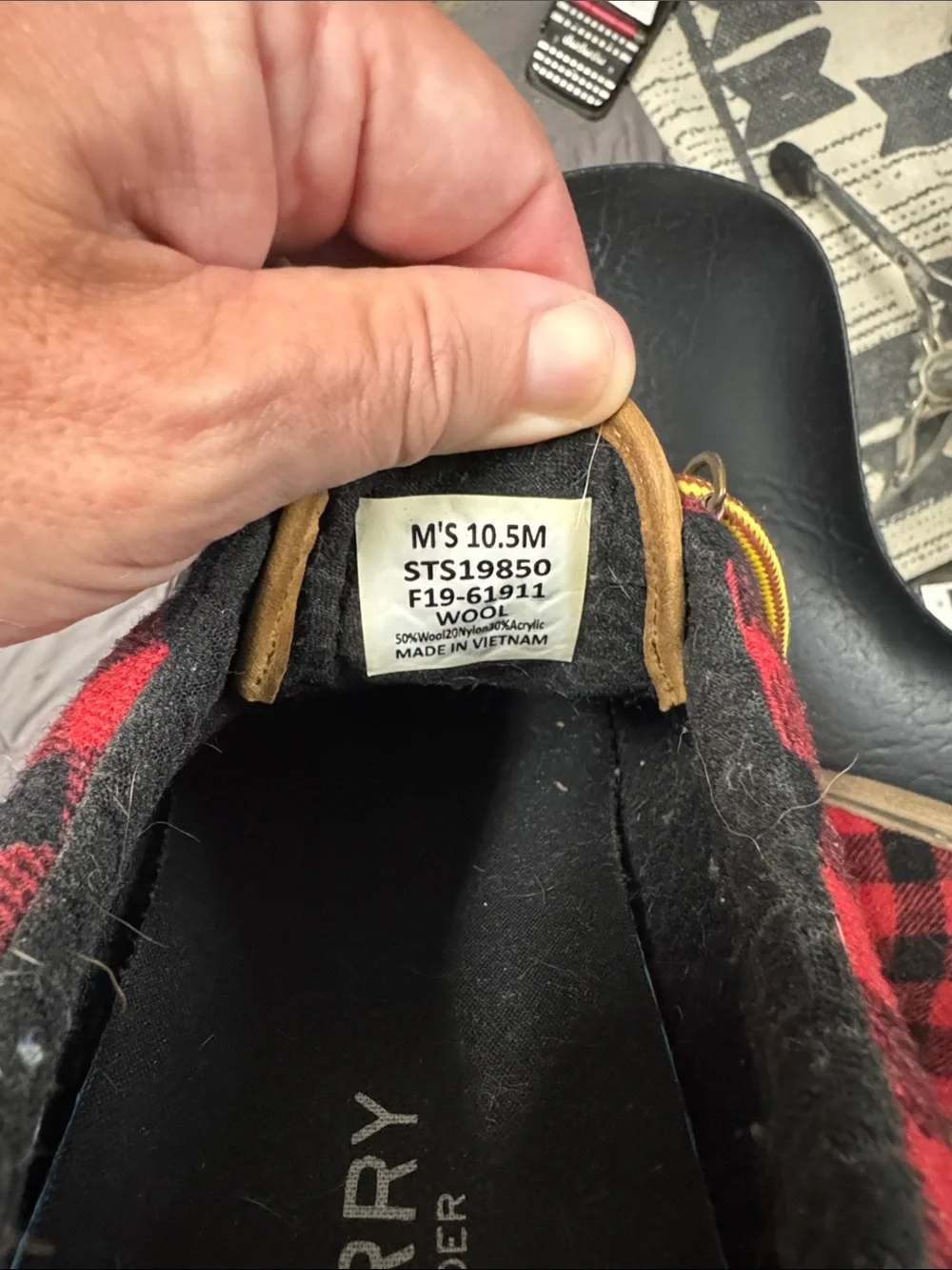 Sperry Red and Black Plaid Boat Shoes with Yellow Laces.